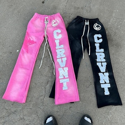Beli men flared sweatpants hitam Oversized Cut Raw Hem Acid Wash Sunfaded Bordir Patch online manufacture
