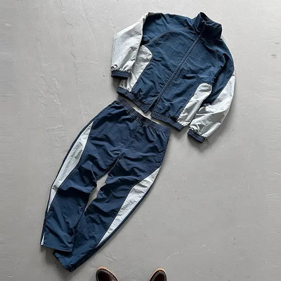 Beli Custom Windbreaker Tracksuit Baggy Mens Jogging Suit Oversized Polyester Nylon Tracksuit Windbreaker Tracksuit Set Pria online manufacture